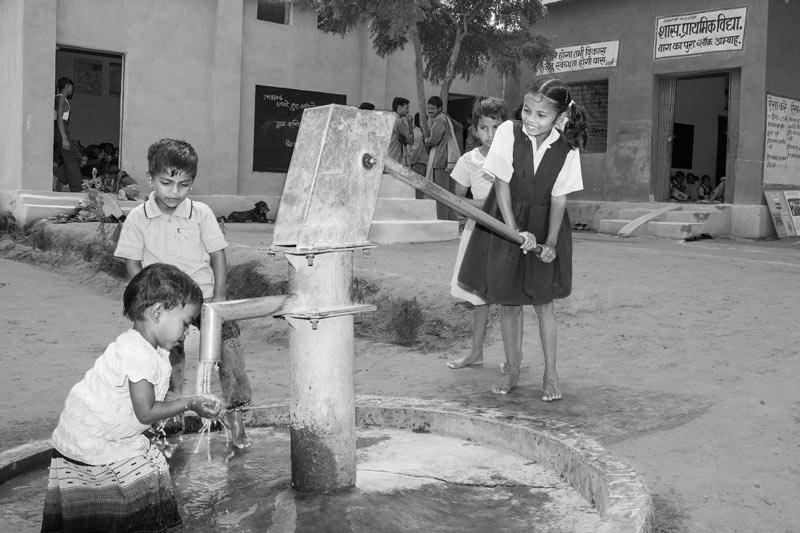 Leaving No One Behind: Human Right to Water in India - Children enjoying sufficient and continuous access to safe water in a school in Morena district, Madhya Pradesh